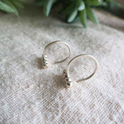 Ellipsis Huggie Earrings