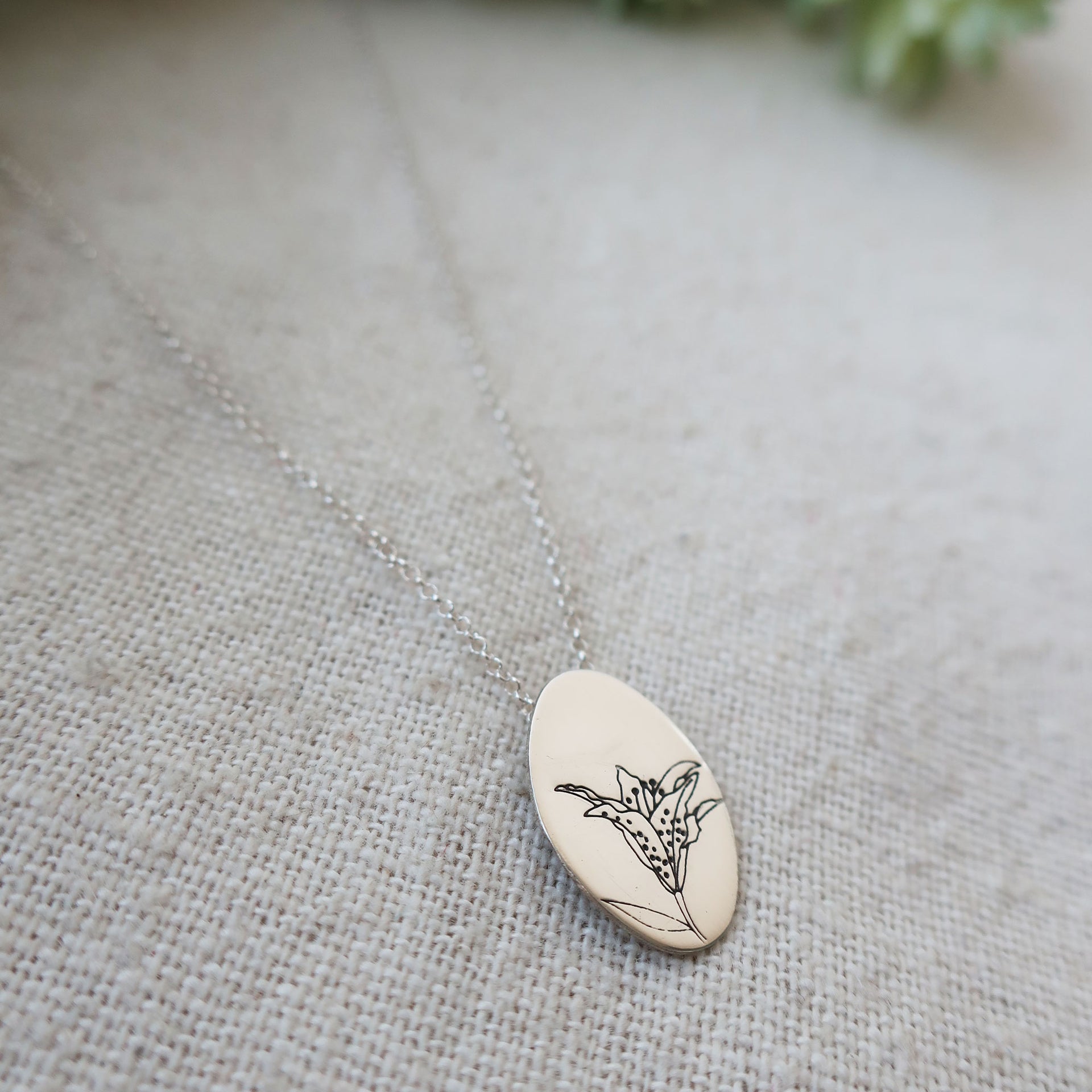 tiger lily pendant Jiji & Jo Hand Stamped Sterling Silver Oval Necklace with Tiger Lily Flower