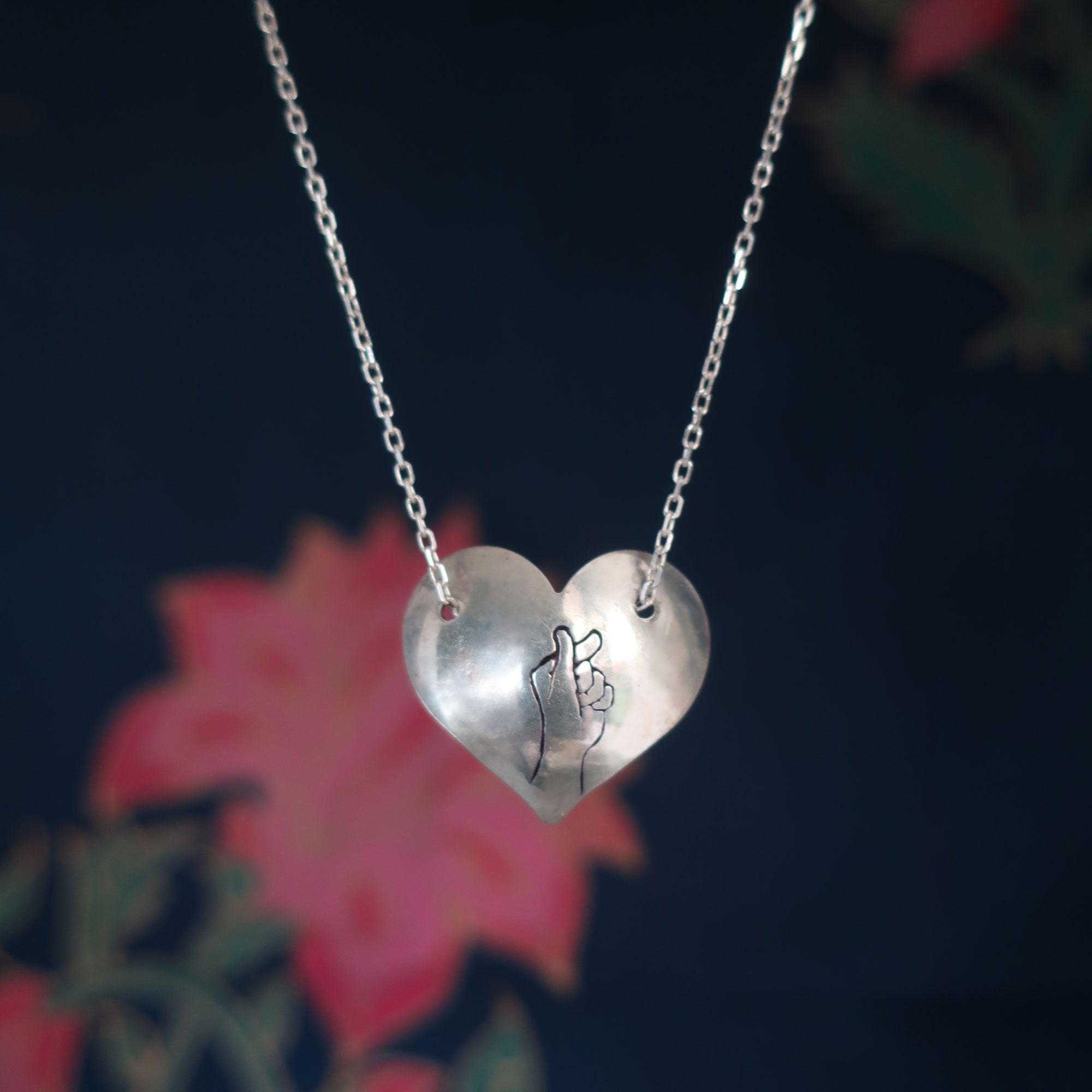 Heart shaped charm on sale necklace